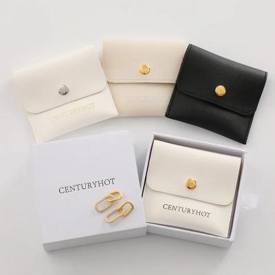 China Attractive 8*8cm beige PU leather bags jewelry pouches jewelry earrings necklace rings bags envelope bags with your logo for sale