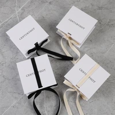 China Eco-friendly Jewelry Box Jewelry Clamshell Ribbon Ring Earring Jewelry Paper Box Bracelet Ring Earrings Pendant Necklace Storage Packaging Box Logo for sale