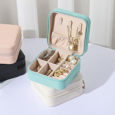 China Fashionable Custom Logo Small Travel Jewelry Box Lady Pu Leather Zipper Closure Earring Jewelry Storage Box Travel Jewelry Organizer for sale