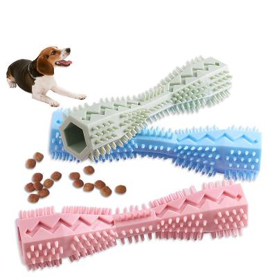 China Funny Stored Leak Food Pet Chew Toys Molar Bite Stick Dog Molar Bite Stick Interactive Training Toy Teeth Cleaning Soft Rubber Durable Dog Toys for sale