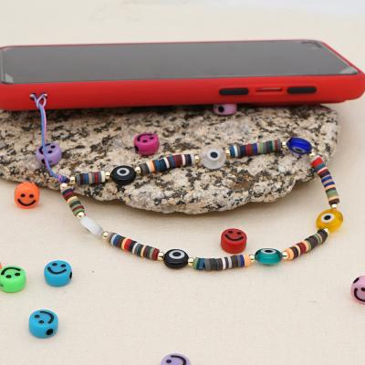 China Cute New Fashion Handmade Beaded Phone Charms Clip Polymer Clay Beads Pearl Smiley Face Acrylic Star Phone Lanyard Accessory for sale