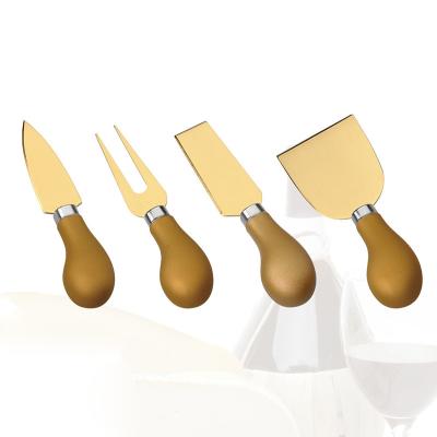 China Sustainable Stainless Steel Cheese Knife Set 4 Pcs Wooden Cheese Knife Gold for sale