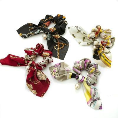 China Korean Hair Scrunchies Ziming Vintage Style Rabbit Ear Pearl New Pearl Bow Knot Hair Scrunchies Print Satin Fabric Chain Hair Tie for sale