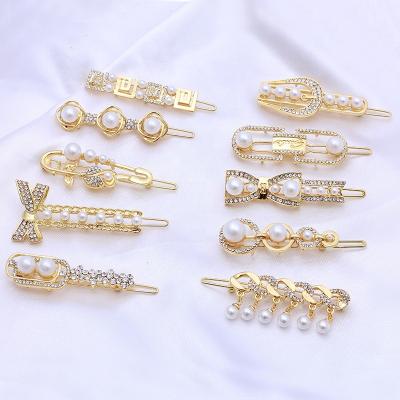 China Ziming Sweet Hot Sale Multiple Style Pearl Beads Gold Metal Hair Clip Diamond Luxury Elegant Girls Bow Knot Hair Clips for sale