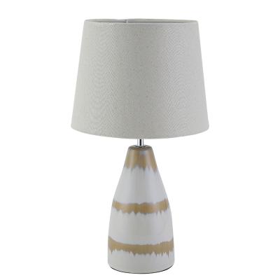 China Modern Wholesale Fancy Yellow And White Line Ceramic Table Lamp With Fabric Shade For Living Room for sale