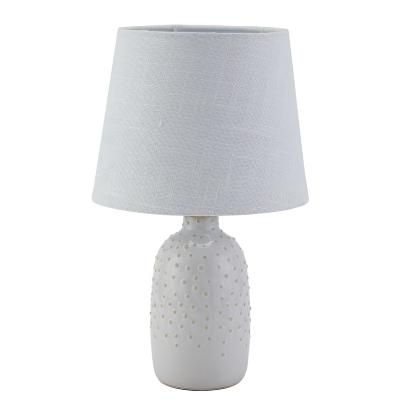 China Modern bedroom decorative hot sale top cream pot ceramic table lamp for hotel for sale