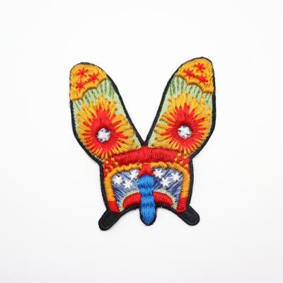 China Beautiful Viable Popular Custom 3d Embroidery Badge Design Gold And Silver Embroidery Butterfly Patch for sale