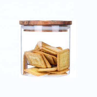 China Freshness Preservation 17oz High Borosilicate Coffee Cookie Candy Storage Heat Resistant Glass Jar With Acacia Wood Lid for sale