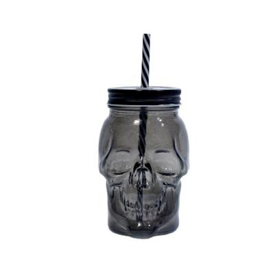 China High Quality Freshness Keeping Kitchen Bar 16oz Skull Shape Black Mason Jar With Metal Lid And Glass Straw for sale