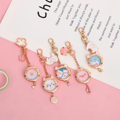 China Personalized Cute Manager Jewelry Gift Cat Sakura Pocket Watch Keychain Pendant Cartoon Schoolbag Decoration Key for Kids for sale