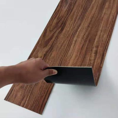 China Modern Design SPC Vinyl Flooring Self-Adhesive Wood Grain Tiles for Easy Maintenance for sale