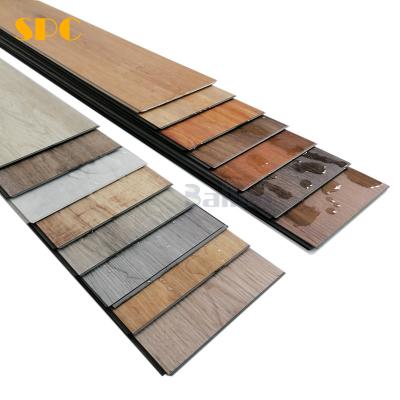 China Moderno diseño SPC piso de color uniforme de madera lujoso aspecto vinilo núcleo rígido SPC pinza de piso en venta