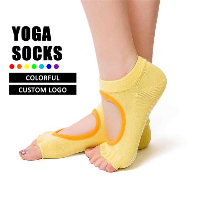 China Antibacterial Custom Fingerless Yoga Socks Silicone Non Slip Women Grip Pilates Yoga Booties Breathable Fitness Socks for sale