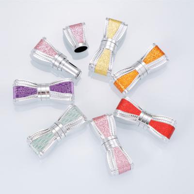 China Cosmetic In Fashion Stock Bow Shape Metallic Luxury Lipstick Containers And Packaging for sale