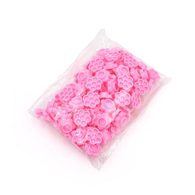 China Flower Glue Cup Delay Grafting Eyelash Extension Tray Wholesale Blooming Glue Cup Cups Flower Shape for sale