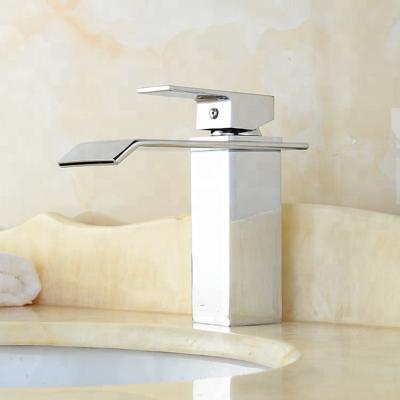 China Modern Luxury Metered Chrome Waterfall Bathroom Sink Faucet Mixer Taps And Basin Faucets for sale