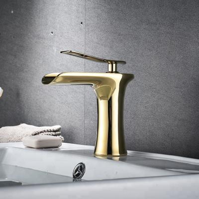 China Gold Metered Waterfall Basin Faucet Sanitary Brass Faucets OEM Gold Mixer Taps for sale