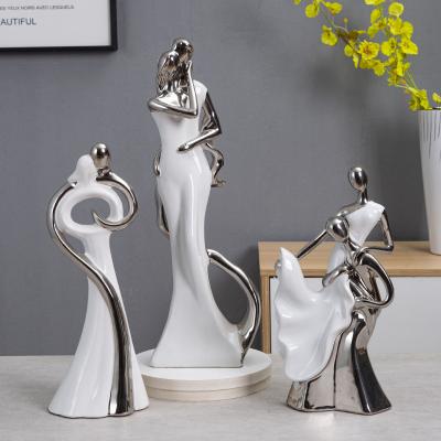 China Minimalist Nordic modern style valentine's day lovers statues luxury sculpture ceramic home decor for wedding gift for sale