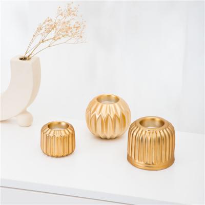 China Gold Candle Holder Available Decoration Of Various Minimalist Luxury Shapes For Wedding for sale