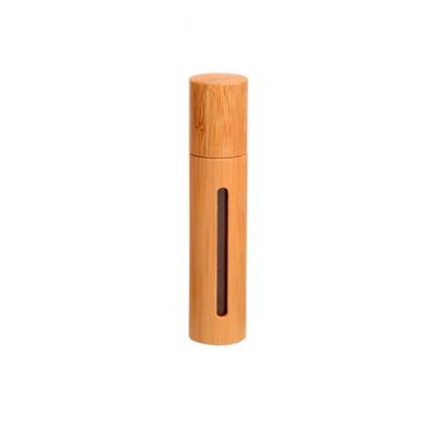 China Wholesale 5ML 10ML Essential Oil Custom Perfume Personal Care Logo Case Bamboo Rollball Bottle for sale