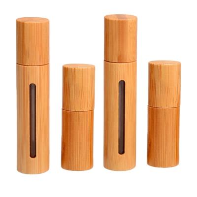 China Natural Bamboo Refillable Empty Fragrance Perfume Personal Care 10ml Essential Oil Rollball Steel Bottle For Travel Home Salon for sale