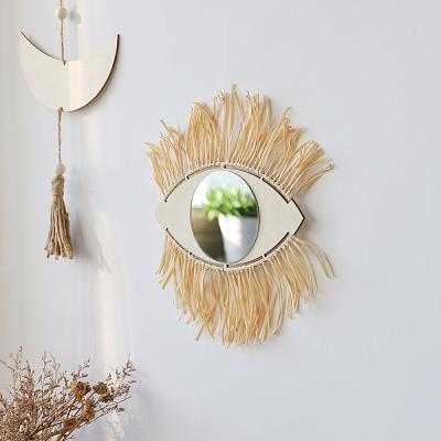 China 2022 Bohemian Hot Selling Evil Eye Macrame Woven Straw Mirror Hanging Wall Boho Makeup Home Decor for sale