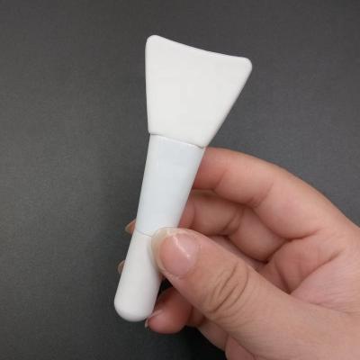 China Pure Small Flat Brush Private Label Short All White Silicone Face Spatula Brush Mud Mask Applicator Silicone Facial Cream Brush for sale