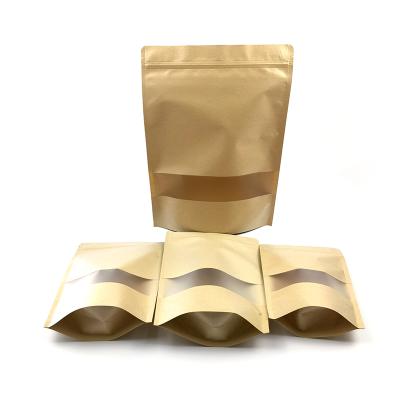 China Front Clear Back Recyclable Kraft Paper Stand Up Bag With Zipper On Top For Rice Packing And Grain Packing for sale