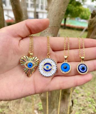 China 2022 FASHION new arrive adjustable thin 18k gold colored rhinestones Crystal Dainty Brass Blue Evil Eyes Pendant Necklace for sale