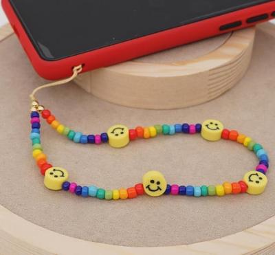 China Fashion Pottery Rainbow Pottery Face Mobile Phone Lanyard Mobile Phone Lanyard Female Beaded Soft Smiley Color Environmentally Friendly for sale