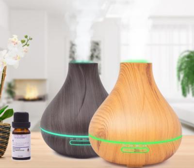 China Smart Ultrasonic Electric Wood Aroma Oil Diffuser Indoor Aromatherapy Stove Household Humidifier for sale