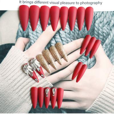 China Hot Selling Design Extra Long Wind Nails Red Diamond Full Cover False Nails Stiletto Glitter Form Press On Nail for sale