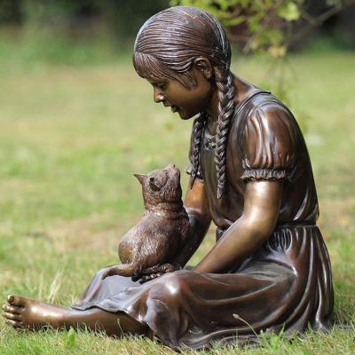 China Life Size Europe Children Bronze Statue Sitting On Lawn Girl Brass Statue for sale