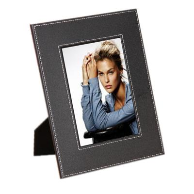 China PU leather+wood embryo+non-woven lining premium classic 5*7 creative home inch black desktop ornament photo frame for sale