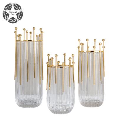 China Modern Diamond Star new light luxury clear flower glass vase with metal stand home decoration for sale