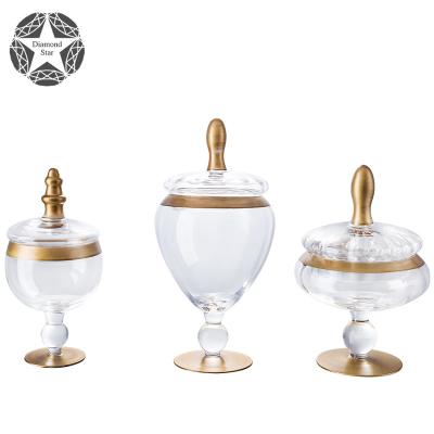 China Stocked Diamond Star Party Decoration Tureen Round Shape Glass Jar With Golden Lid for sale