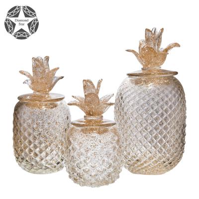 China Stocked Diamond Star Clear gold with Lid glass jar pineapple for home decoration glass jar for sale