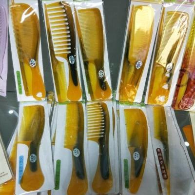 China Cheap Para wholesale Antisatic carbon fiber comb producto plastic bee comb for sale