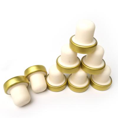 China Non Refillable Gold Finish Aluminum Top Cap T Shape Plastic Elastomer Cork Stopper For Champagne Vodka Wine Bottle for sale