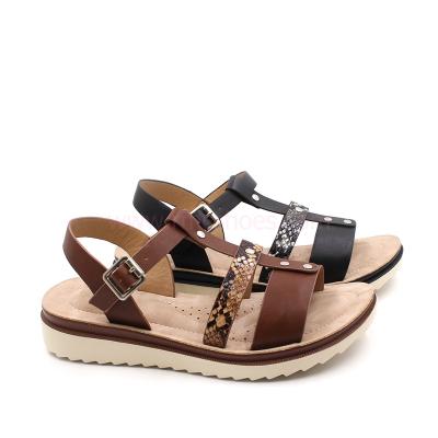 China Lightweight Shoe Making Women Cross Strap Snake Pattern Comfortable Unique PU Sandals for sale