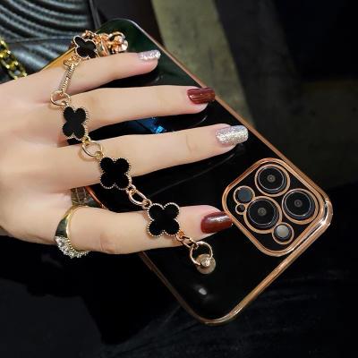 China Luxury Anti-drop Clover Wristband Plating Soft Wristband Covers For Oppo A94 RENO5 Phone Case Girl 6 A53 A31 A3s A15 A7X for sale