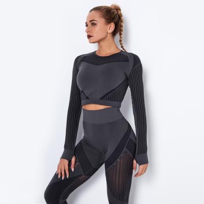 China Antibacterial Women Gym Seamless Sports Suits Long Sleeve Fitness Yoga Suit Dry Fit Running Pants 2 Pieces for sale