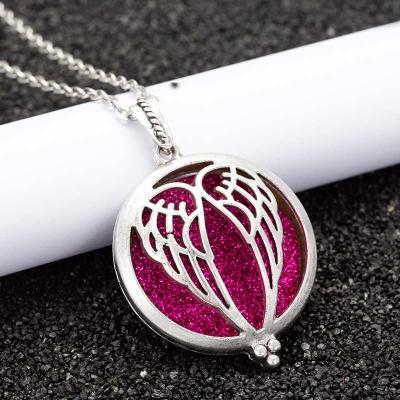 China Wholesale FASHIONABLE Aromatherapy Women's Custom Wing Pendant Photo Box Jewelry Perfume Essential Oil Diffuser Jewelry for sale