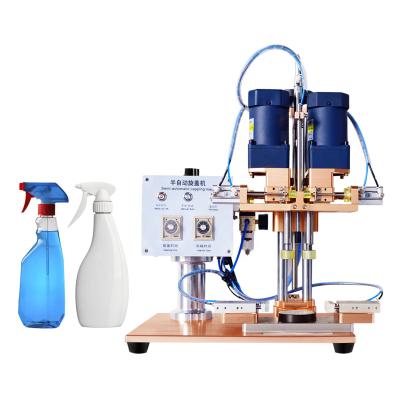 China Work stably with TDX-S2M high efficiency semi-automatic cream cosmetic bottle screw clamping machine four wheel bottle capping machine for sale