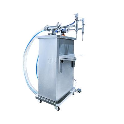 China 150ml Semi-automatic Food Potato Sauce Bottle Filling Machine Double Head Filling Machine for sale