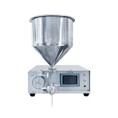 China Food TNDE small paste dose microcomputer filling machine jam with particle of mango filling machines for sale