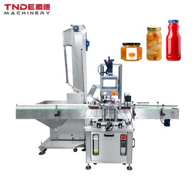 China TD-AXG05 food jar capsule machine automatic jam juice glass capsule feeder capping machines for sale