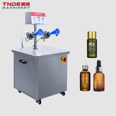 China Avoid secondary pollution and eliminate static electricity by TDC-02 Factory price cosmetic anion perfume glass bottle bottle dust collector clearing dust machine for sale