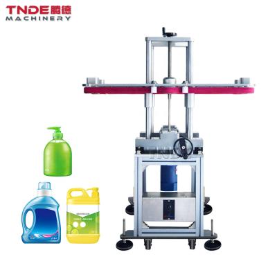 China TDJ-01 Plastic Carrier Belt Food Factory Round Flange Bottomless Side Bottle Transfer Bottomless Belt Conveyor for sale