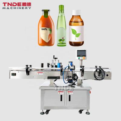 China TDT-A01 automatic food labeling machine round bottle sticker automatic date labeling printing machine for sale